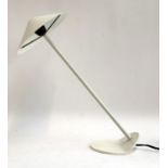 A mid century style white lamp with unusual angled base