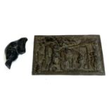 A heavy cast metal plaque depicting a pastoral scene, 24x38cm, together with a carved soapstone seal