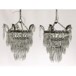 A pair of three tier glass drop chandeliers, approx. 28cm long, together with a four tier chandelier