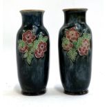 A pair of Royal Doulton stoneware vases with tube lined prunus design, stamped to base 9484, 20.5cmH