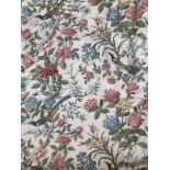 A pair of lined and interlined curtains, in an exotic bird print, 290cm wide ungathered, 270cm