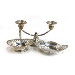 A small pierced silver bonbon dish by William Hutton & Sons; together with a white metal dish marked