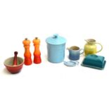 A quantity of Le Creuset comprising butter dish, pestle and mortar, biscuit barrel, tea strainer,