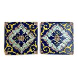 Two Arabesque glazed ceramic tiles, 14.5cm square