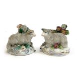 A pair of Staffordshire sheep figurines, both af, approx. 6cmH