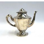 A white metal teapot, marked 'Sterling Mexico' to base, 1140g, 36ozt