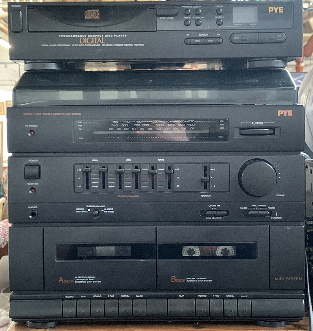 A PYE stereo tuner, double cassette midi system, with turntable and PYE CD player; together with a