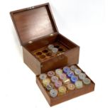 A 19th century mahogany artist's box, the fitted interior containing jars of various pigments
