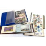 Two stamp albums containing British and World stamps, together with an album of Jersey