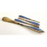 A four piece silver gilt and guilloche enamel manicure set, including a shoe horn, by Adderly