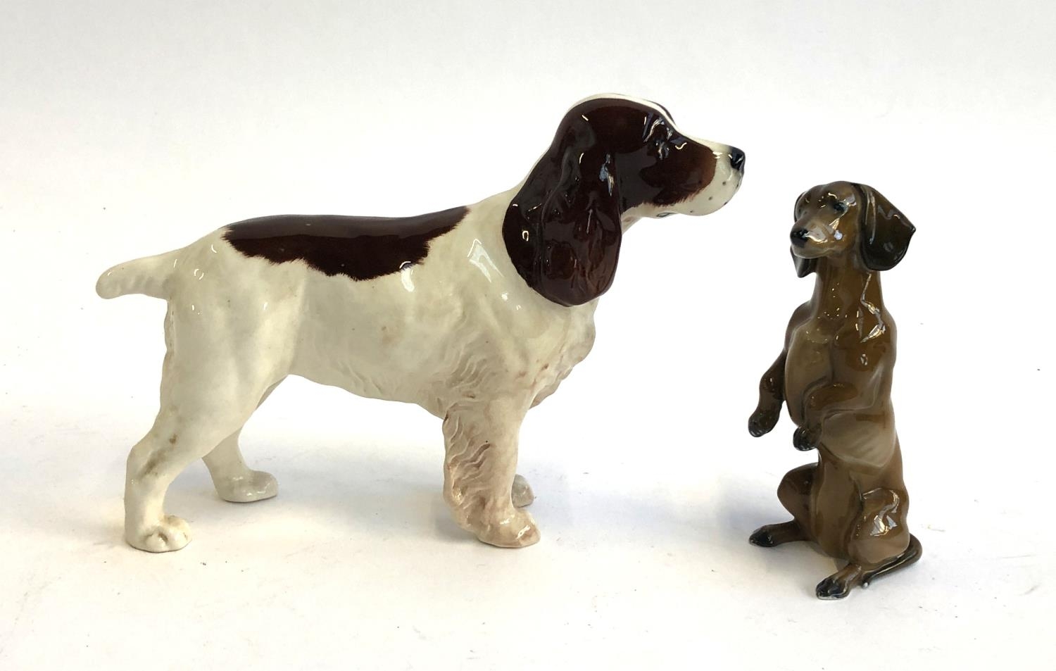 A Beswick spaniel; together with a Rosenthal Dachshund