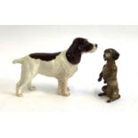 A Beswick spaniel; together with a Rosenthal Dachshund