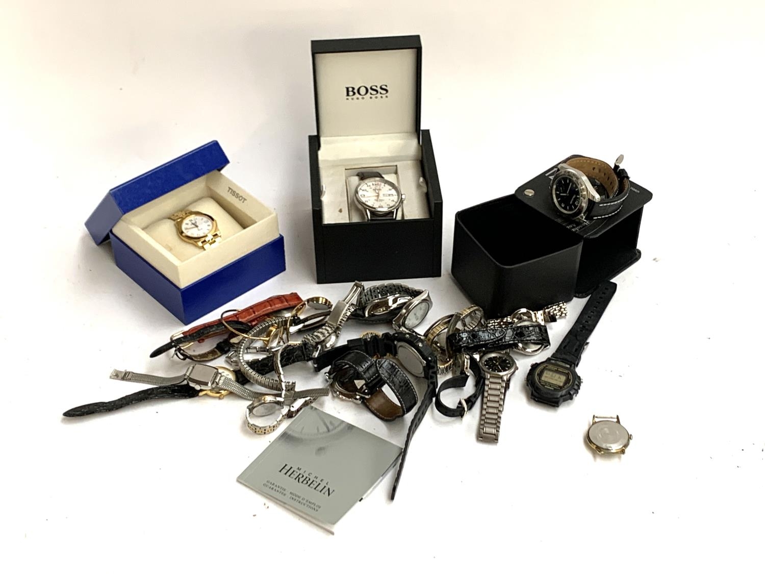 A mixed lot of gents wristwatches to include Tissot, Hugo Boss, Casio, Avia, Herbelin, etc