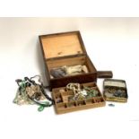A jewellery box containing various early 20th century bead necklaces, to include make-do necklace,