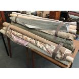A large quantity of fabric rolls, holding various lengths