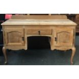 An oak dressing table, three part mirror, the base with three drawers on cabriole legs, 122x53x72cm