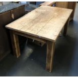 A sturdy pine kitchen table, 152x92x78cmH