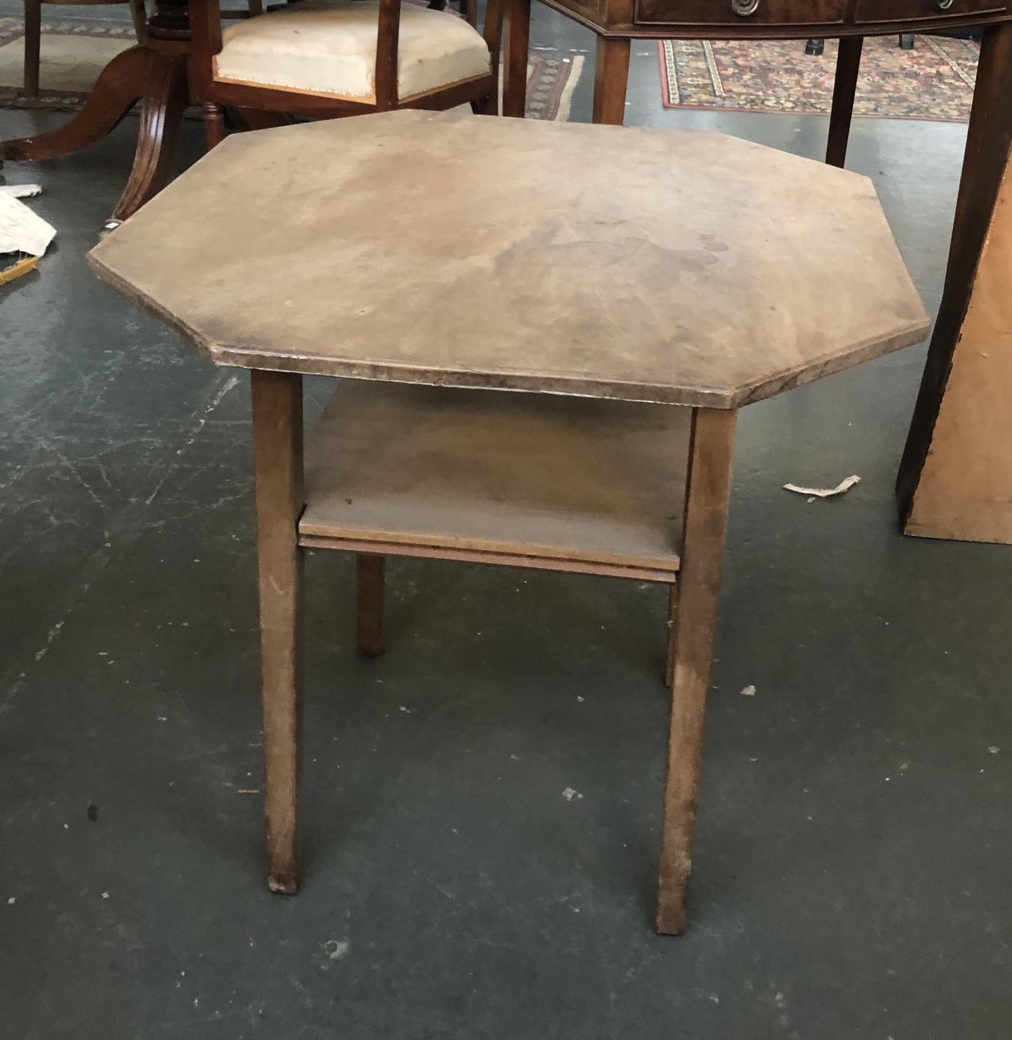 An octagonal occasional table with undershelf, 65x65x63cmH
