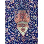 A very large blue ground wool rug, with central medallion and hanging lantern pattern, 410x320cm