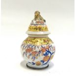 An Aerozon Germany porcelain censer, with screw-action lid surmounted by a foo dog heightened in