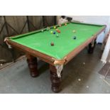 A half size slate billiards table, on substantial turned legs