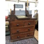 A mahogany dressing table, adjustable mirror, over a base with two short over two long drawers,