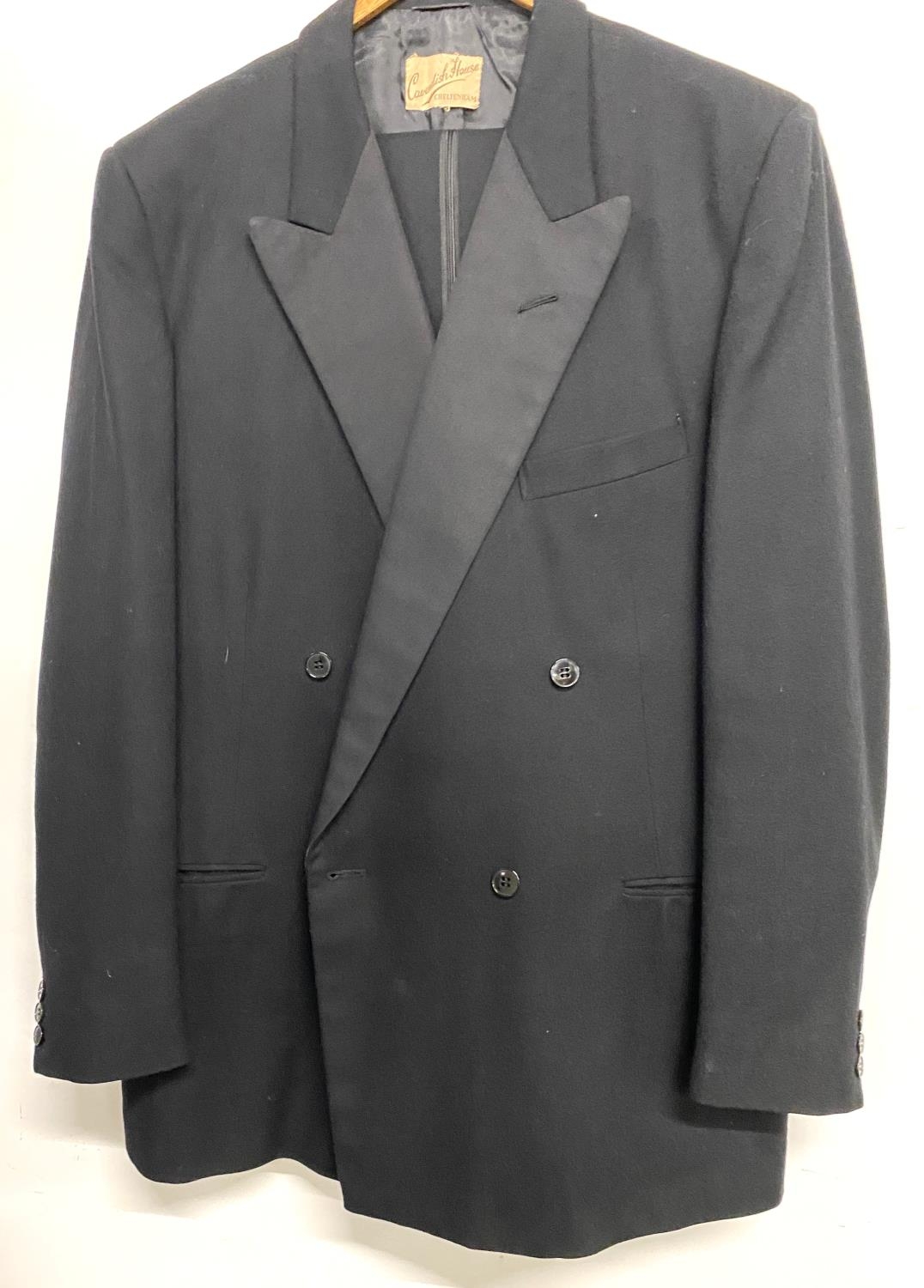 A Cavendish House tailored double breasted dinner jacket with trousers, the lapels with corded black