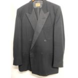 A Cavendish House tailored double breasted dinner jacket with trousers, the lapels with corded black