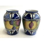 A pair of Charlotte Rhead Burleigh ware lustre vases, one chipped to rim, 11cmH