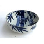 A Chinese blue and white bowl with bamboo decoration, marks to base, 24cmD