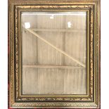 A rectangular wall mirror in giltwood ebonised frame, 70x59cm