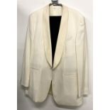 A Baumler Reda white wool dinner jacket with shawl collar and black evening trousers, size 44L