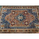 A West Persian rug with central serrated lozenge, 210x148cm