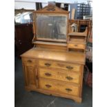 An early 20th century ash dressing table, with adjustable mirror and single drawer, base with
