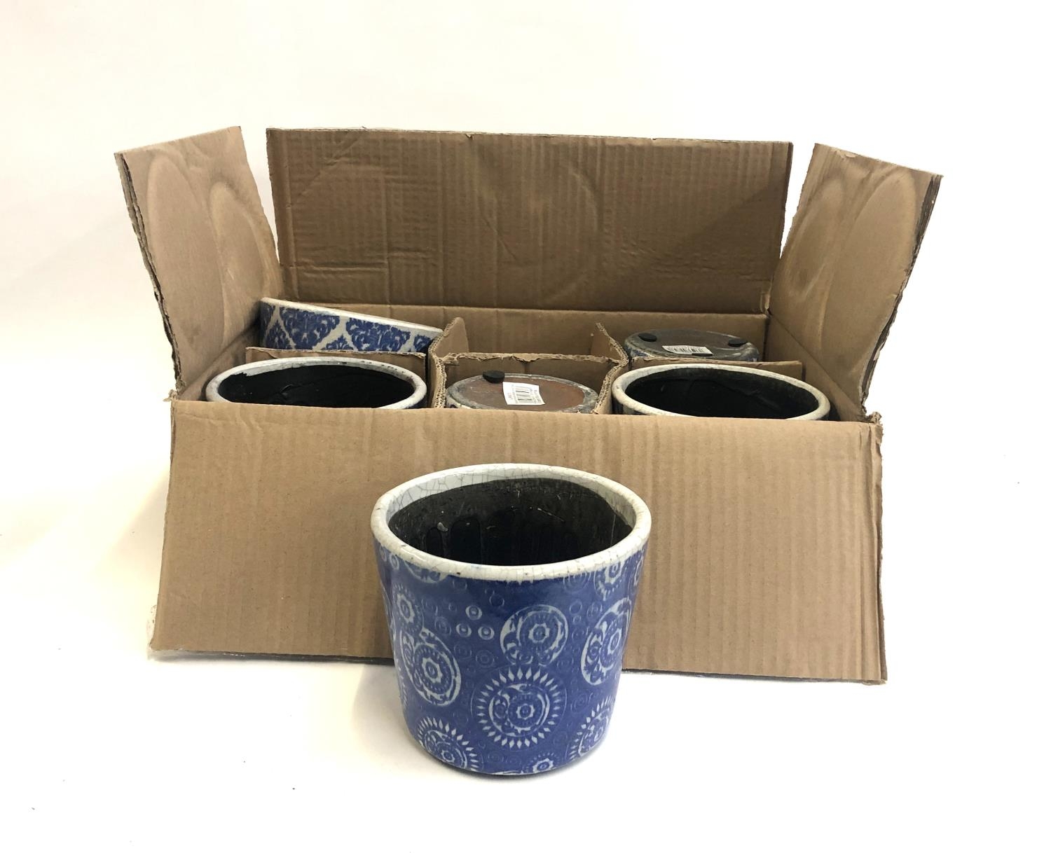 A box of six Grand Illusions blue and white flower pots, each 14cmD