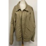 A Wolwedans cotton jacket, size XL, together with a Cotton Traders jacket, size 50 and a Cedarwood