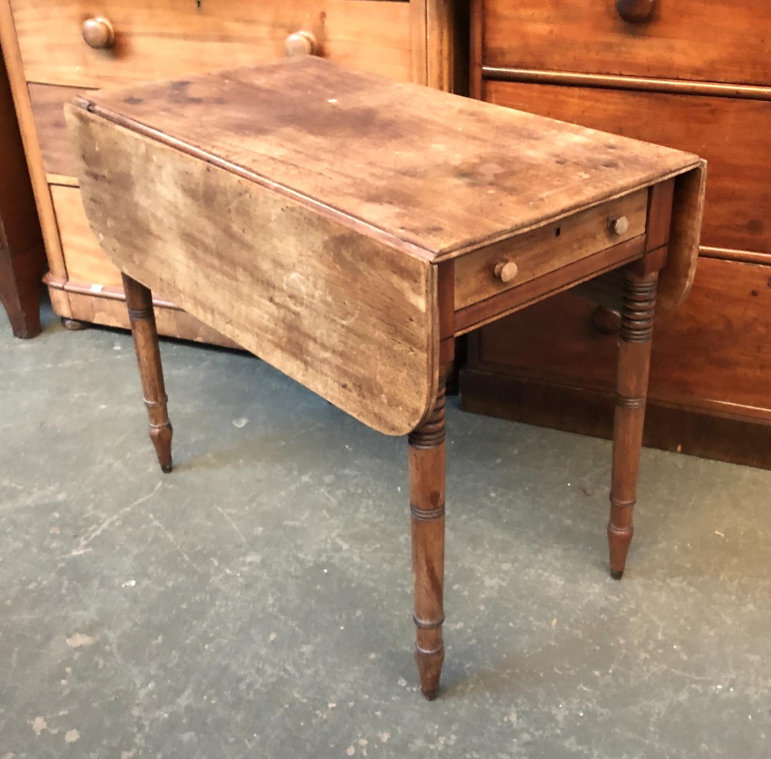 A 19th century mahogany pembroke table, single end drawer, on ring turned tapering legs, 83x47x69cmH