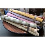 A large quantity of fabric rolls, holding various lengths