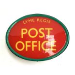 An oval Lyme Regis Post Office sign, 28x27cm