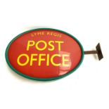 A large vintage double sided Lyme Regis Post Office sign, 88x53cm including bracket