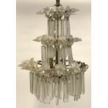 A three tier glass drop chandelier, approx. 50cmH