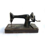 A Singer sewing machine (af), Serial no. F8575603