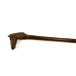 A hardwood walking stick with carved terminal in the form of a giraffe's head, 95cmL