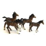 A lot of four Beswick foals, two af, the tallest 13cmH (4)