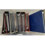 A large quantity of first day covers in albums