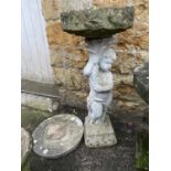 A composite stone bird bath with circular plinth base, 100cmH