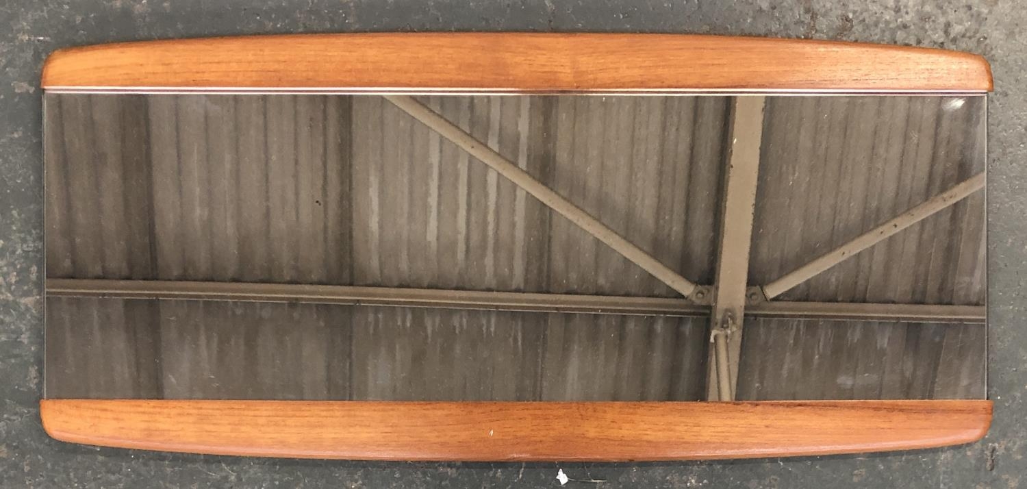 A mid century teak framed mirror, 36x79cm