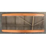 A mid century teak framed mirror, 36x79cm