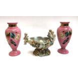 A pair of Victorian pink opaline glass vases hand painted with birds and foliage, each 27cmH; togeth