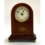 A mahogany domed small eight day mantel clock, white enamel dial with Arabic numerals, 18cmH